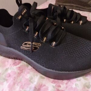 Skechers Women's Black Sneakers with Gold Highlights